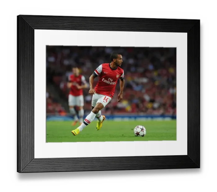 Framed Print : Theo Walcott in Action: Arsenal vs. Fenerbahce, UEFA Champions League Play-offs (2013)