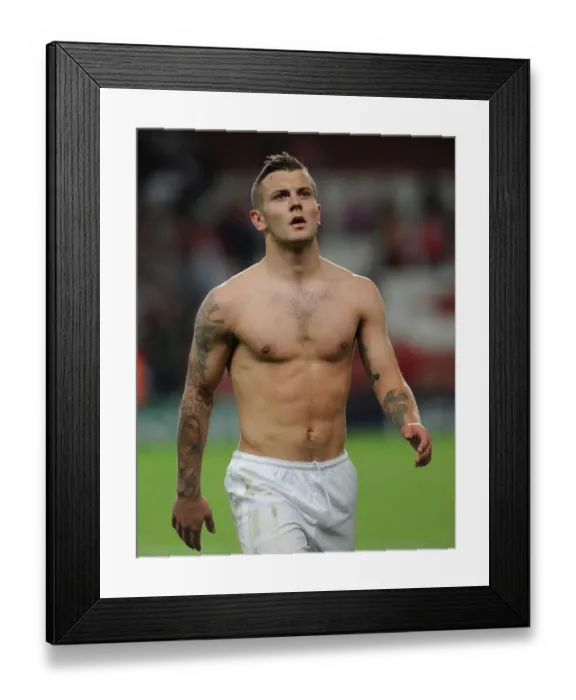 Framed Print : Jack Wilshere: Arsenal's Determination - Arsenal FC vs Fenerbahce SK, UEFA Champions League Play-offs (2013)
