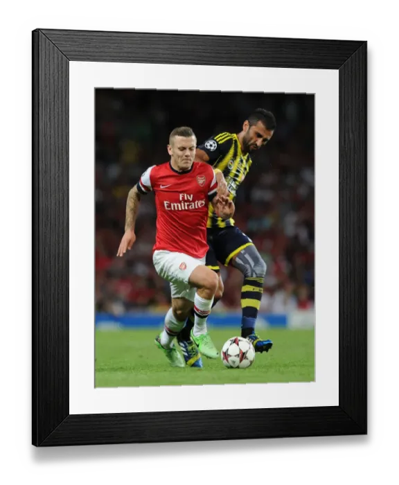 Framed Print : Jack Wilshere Overpowers Selcuk Sahin: Arsenal's Champion League Battle