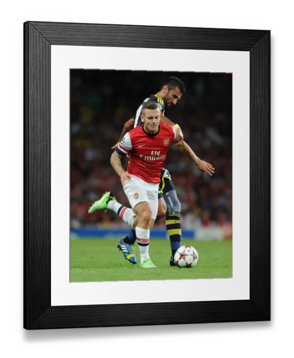 Framed Print : Jack Wilshere's Dominant Moment: Arsenal's Champions League Victory over Selcuk Sahin (2013)