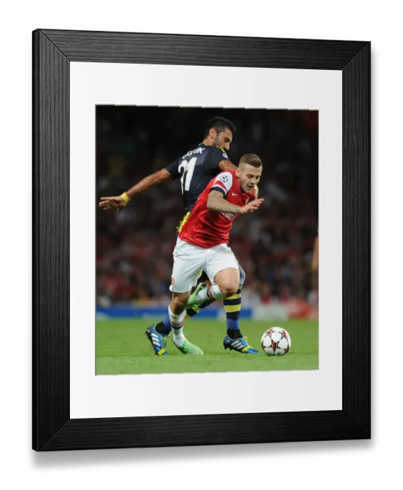Framed Print : Jack Wilshere's Overpowering Moment: Arsenal's Champions League Triumph over Selcuk Sahin (2013)