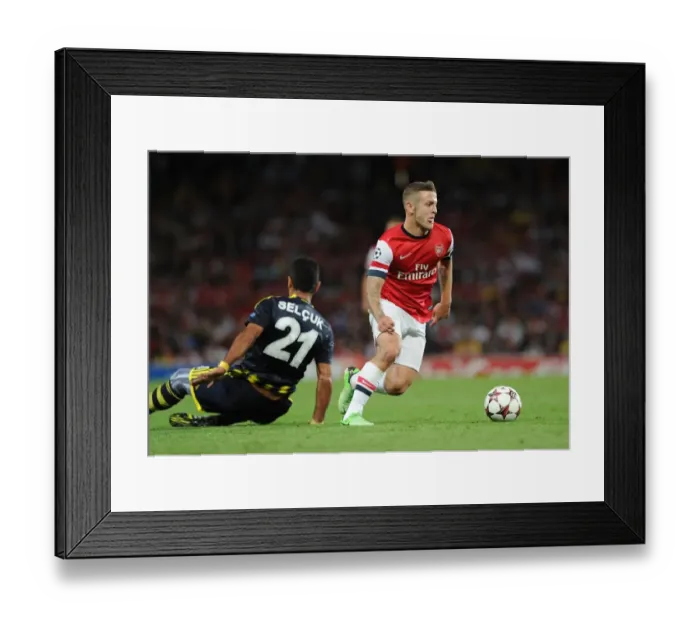 Framed Print : Arsenal's Midfield Battle: Wilshere vs. Sahin (Champions League Play-offs, Arsenal vs. Fenerbahce, 2013-14)