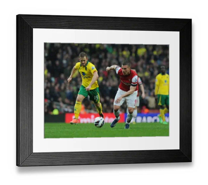 Framed Print : Arsenal vs Norwich City: Premier League Showdown at Emirates Stadium, London (April 2013)