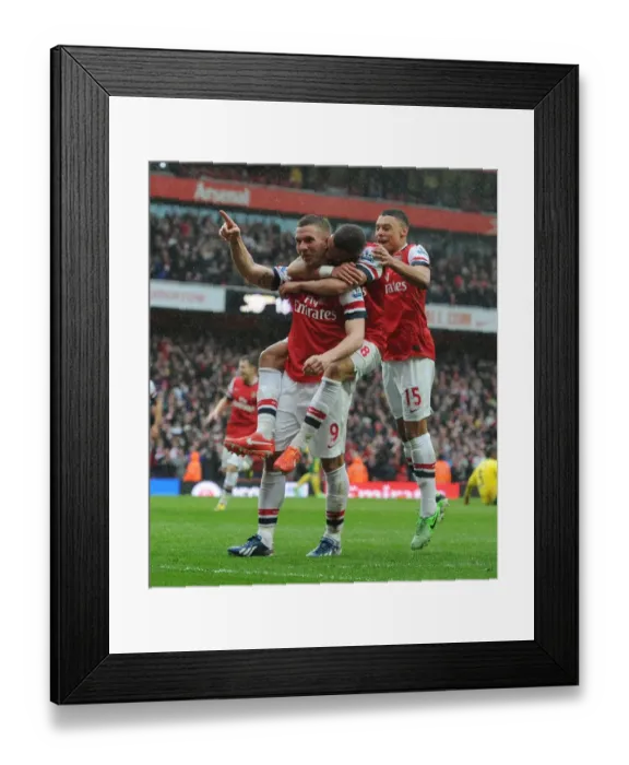 Framed Print : Arsenal's Podolski Scores Third Goal Against Norwich City, April 2013 Framed Print : Arsenal's Podolski Scores Third Goal Against Norwich City, April 2013