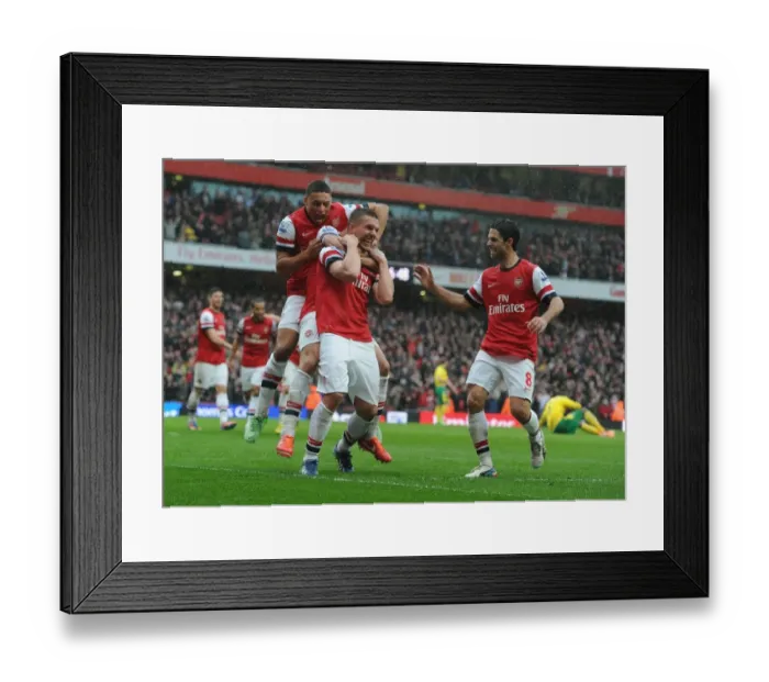Framed Print : Arsenal's Triumph: Podolski, Oxlade-Chamberlain, and Arteta Celebrate Goals Against Norwich City (2012-13) Framed Print : Arsenal's Triumph: Podolski, Oxlade-Chamberlain, and Arteta Celebrate Goals Against Norwich City (2012-13)