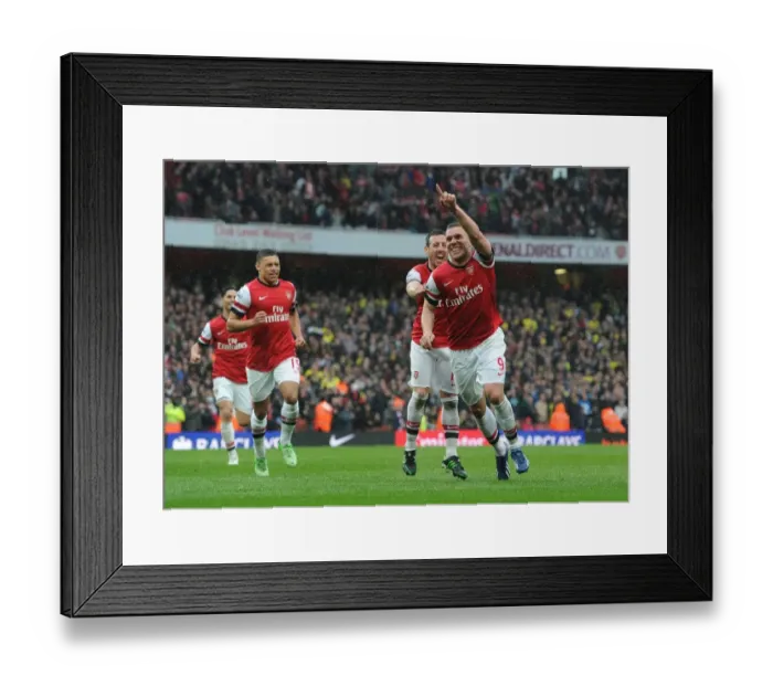 Framed Print : Arsenal: Podolski and Cazorla's Triumphant Goal Celebration vs Norwich City (2012-13) Framed Print : Arsenal: Podolski and Cazorla's Triumphant Goal Celebration vs Norwich City (2012-13)