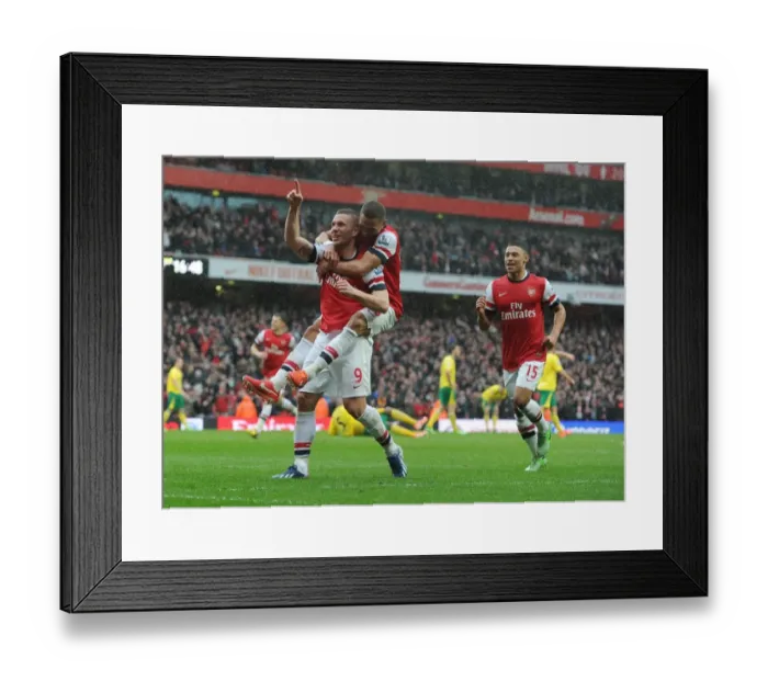 Framed Print : Arsenal's Podolski Scores Third Goal vs. Norwich City (2012-13)