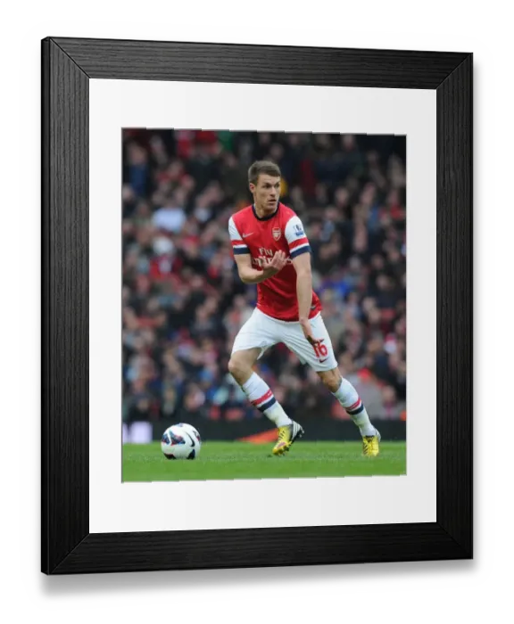 Framed Print : Arsenal's Aaron Ramsey in Action: Arsenal vs. Norwich City (2012-13) Framed Print : Arsenal's Aaron Ramsey in Action: Arsenal vs. Norwich City (2012-13)