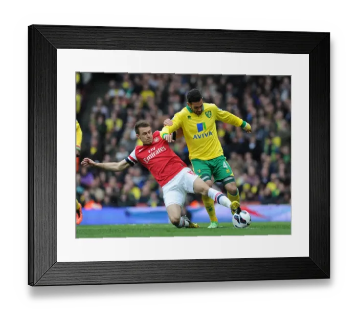 Framed Print : Midfield Showdown: Ramsey vs. Johnson - Arsenal vs. Norwich City (2012-13) Framed Print : Midfield Showdown: Ramsey vs. Johnson - Arsenal vs. Norwich City (2012-13)
