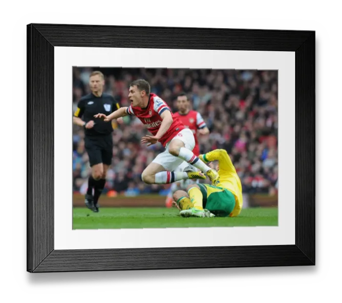 Framed Print : Arsenal vs. Norwich City: Battle between Ramsey and Johnson at the Emirates Framed Print : Arsenal vs. Norwich City: Battle between Ramsey and Johnson at the Emirates