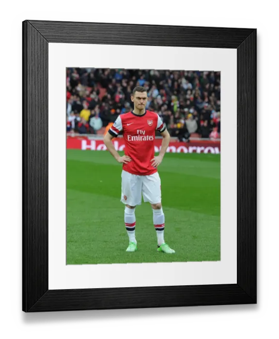 Framed Print : Arsenal's Thomas Vermaelen Prepares for Arsenal v Norwich City Clash (2012-13) Framed Print : Arsenal's Thomas Vermaelen Prepares for Arsenal v Norwich City Clash (2012-13)
