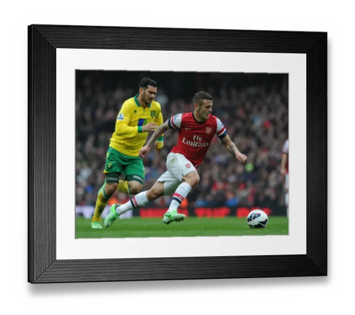 Framed Print : Jack Wilshere's Agile Moves: Outmaneuvering Norwich's Bradley Johnson in the 2012-13 Arsenal Victory