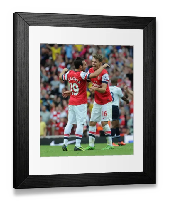 Framed Print : Arsenal Celebration: Ramsey and Cazorla Rejoice in Derby Victory over Tottenham, 2013-14 Framed Print : Arsenal Celebration: Ramsey and Cazorla Rejoice in Derby Victory over Tottenham, 2013-14