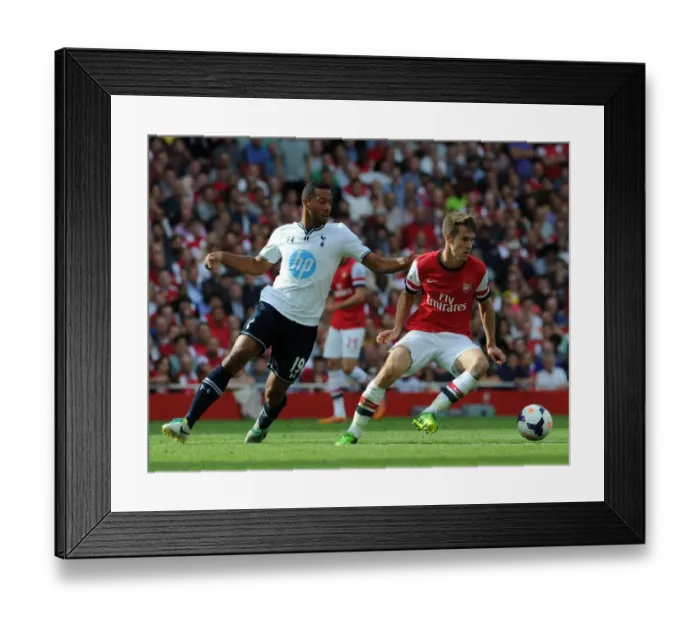 Framed Print : Arsenal's Aaron Ramsey Fends Off Tottenham's Mousa Dembele in Intense Premier League Clash