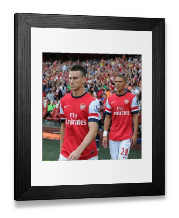 Framed Print : Arsenal's Laurent Koscielny Before Arsenal v Tottenham Hotspur, Premier League 2013-14
