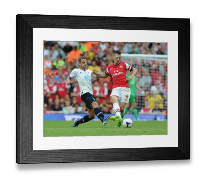 Framed Print : Clash of Titans: Koscielny vs. Soldado - Arsenal vs. Tottenham Rivalry Framed Print : Clash of Titans: Koscielny vs. Soldado - Arsenal vs. Tottenham Rivalry