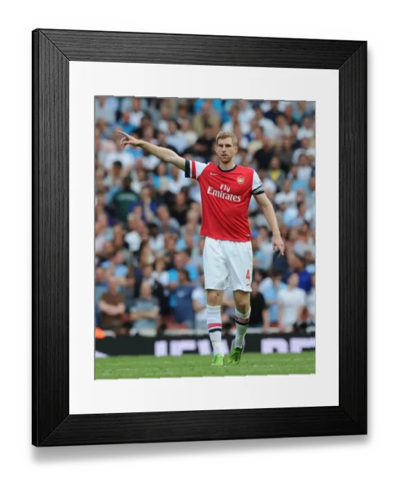 Framed Print : Arsenal vs. Tottenham: Per Mertesacker in Action at the Emirates Stadium (2013-14)