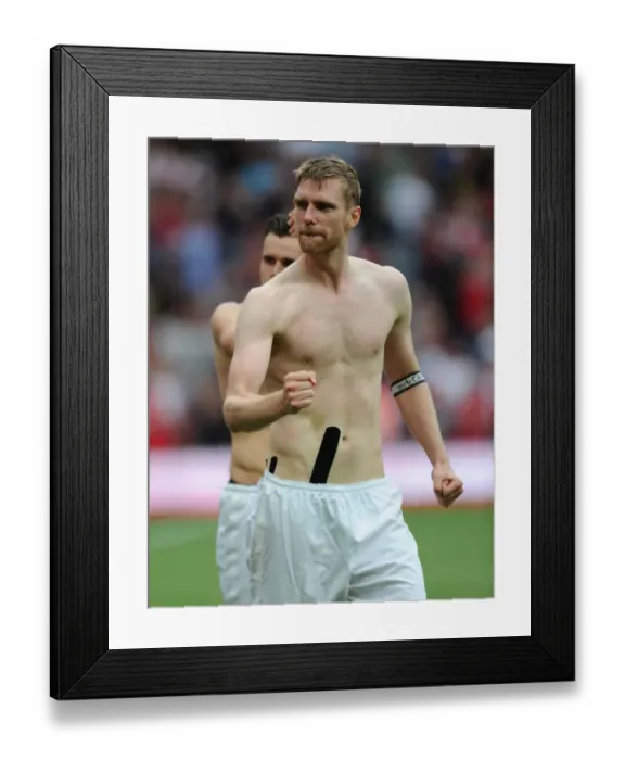 Framed Print : Per Mertesacker: Arsenal vs. Tottenham Hotspur, Premier League 2013-14 - Post-Match Intensity Framed Print : Per Mertesacker: Arsenal vs. Tottenham Hotspur, Premier League 2013-14 - Post-Match Intensity