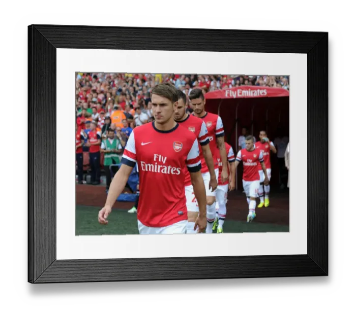 Framed Print : Arsenal's Aaron Ramsey Gears Up for Arsenal v Tottenham Showdown (2013-14)