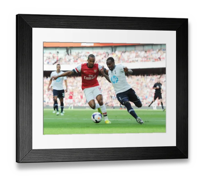 Framed Print : Arsenal vs. Tottenham: Theo Walcott vs. Danny Rose - Intense Battle in the 2013-14 Premier League