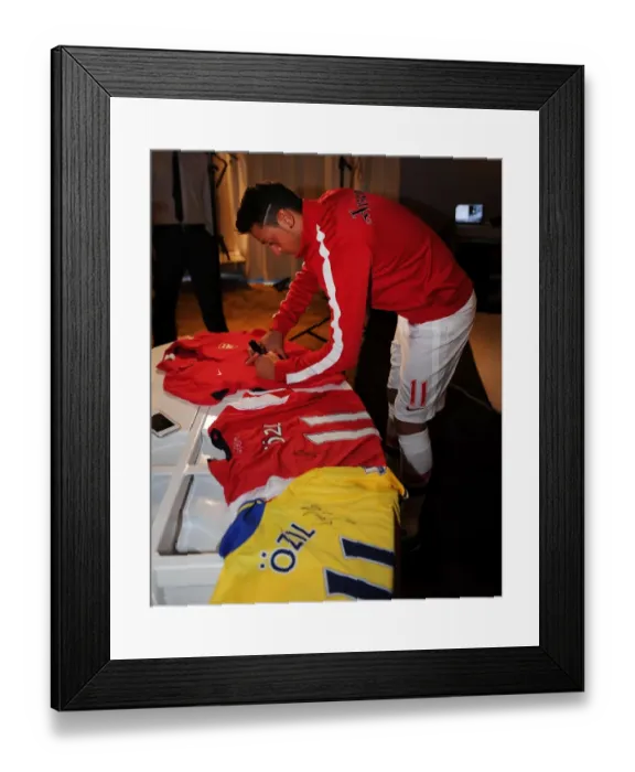 Framed Print : Mesut Ozil's Munich Debut: Arsenal's New Signing at Photo Shoot