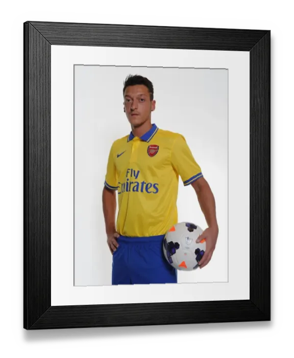 Framed Print : Mesut Ozil's Munich Debut: Arsenal's New Signing at Photo Shoot