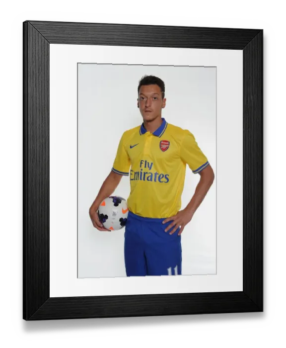 Framed Print : Mesut Ozil's Munich Debut: Arsenal's New Signing at Photo Shoot