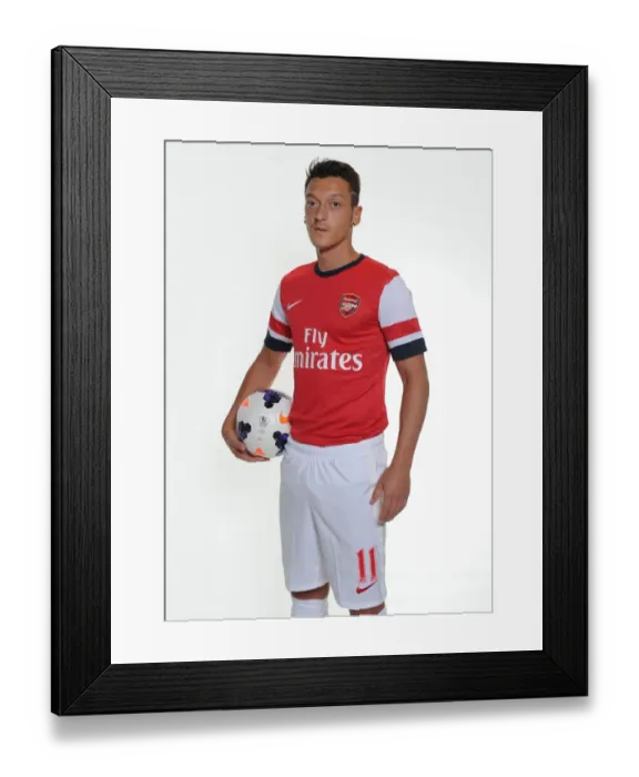 Framed Print : Mesut Ozil's Munich Debut: Arsenal's New Signing at Photo Shoot