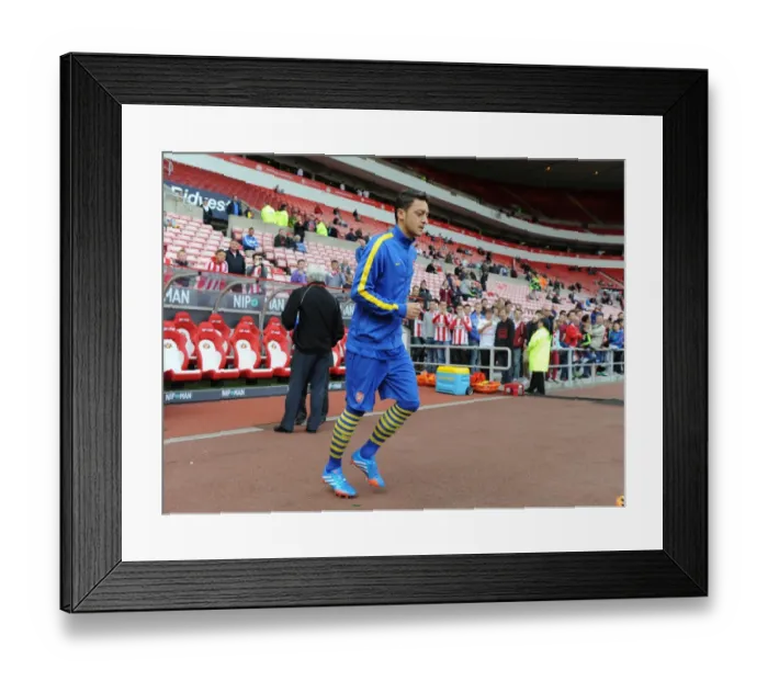 Framed Print : Mesut Ozil Shines: Arsenal Crush Sunderland 3-1 in Premier League
