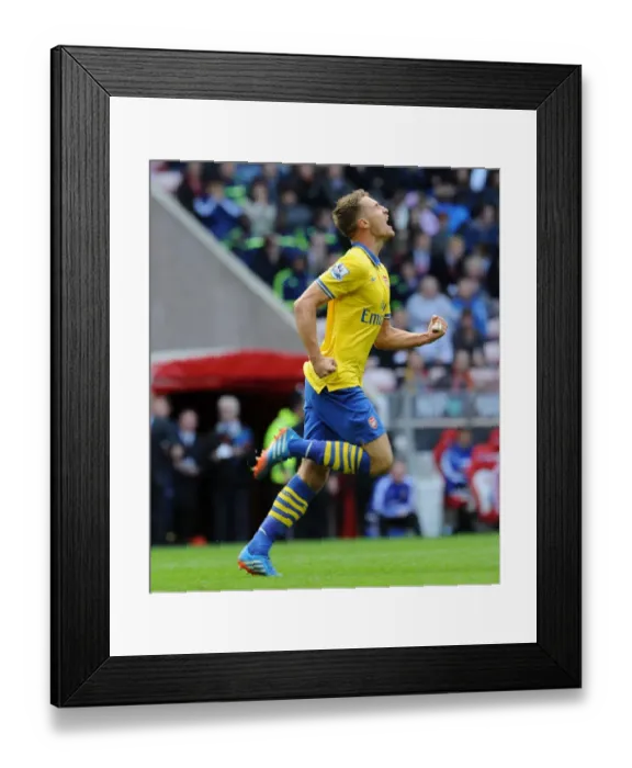 Framed Print : Arsenal's Double Victory: Ramsey Scores the Decisive Goal against Sunderland (September 14, 2013)