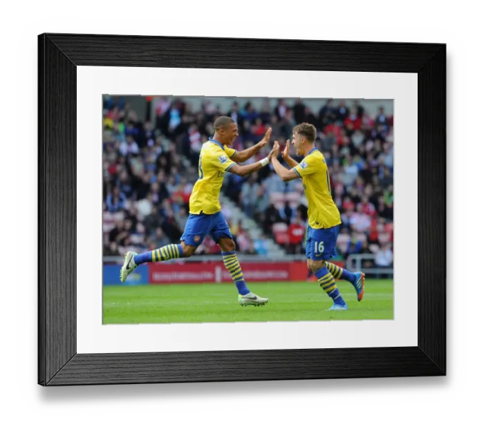 Framed Print : Aaron Ramsey and Kieran Gibbs Celebrate Arsenal's Winning Goals Against Sunderland (2013-14)