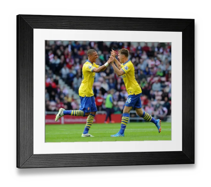 Framed Print : Aaron Ramsey's Brace: Arsenal's Victory Over Sunderland (2013-14) Framed Print : Aaron Ramsey's Brace: Arsenal's Victory Over Sunderland (2013-14)