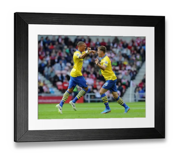 Framed Print : Arsenal's Unstoppable Duo: Ramsey and Gibbs Celebrate Goals Against Sunderland (2013-14)