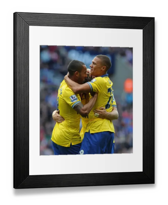 Framed Print : Aaron Ramsey celebrates scoring his 2nd goal, Arsenals 3rd, with Theo Walcott and Kieran Gibbs Framed Print : Aaron Ramsey celebrates scoring his 2nd goal, Arsenals 3rd, with Theo Walcott and Kieran Gibbs