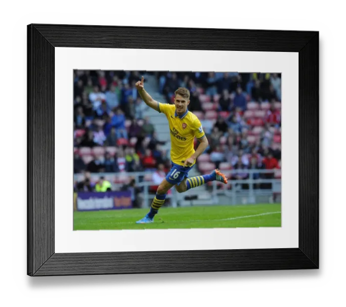 Framed Print : Aaron Ramsey's Brace: Arsenal's 3-0 Victory Over Sunderland (2013-14)