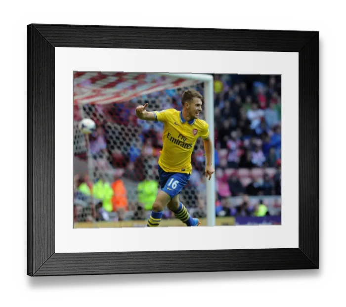 Framed Print : Arsenal's Aaron Ramsey Scores Brace in Triumphant 3-0 Win over Sunderland (2013-14)