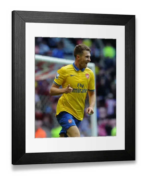 Framed Print : Arsenal's Aaron Ramsey Scores Brace: 3-0 Victory over Sunderland (2013-14)