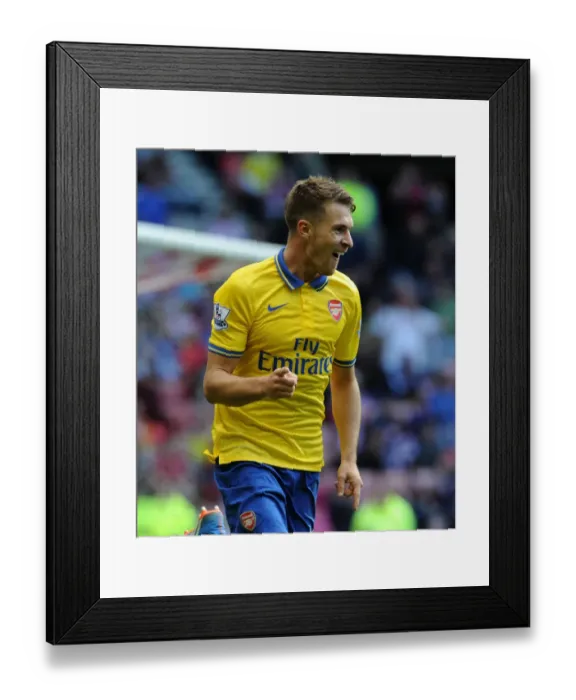 Framed Print : Aaron Ramsey's Brace: Arsenal's Dominance Over Sunderland in 2013-14 Premier League