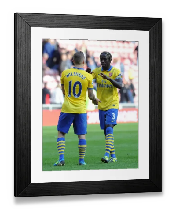 Framed Print : Battle at the Stadium of Light: Sunderland vs Arsenal - Premier League 2013-14: A Football Rivalry Unfolds