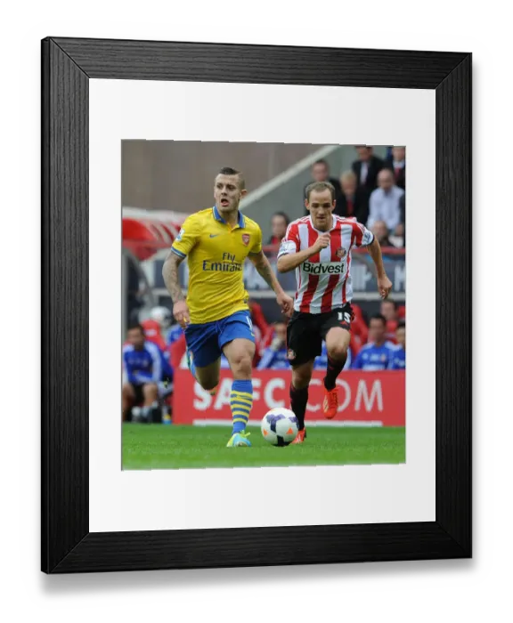Framed Print : Jack Wilshere Outruns David Vaughan: Sunderland vs Arsenal, Premier League 2013-14 Framed Print : Jack Wilshere Outruns David Vaughan: Sunderland vs Arsenal, Premier League 2013-14