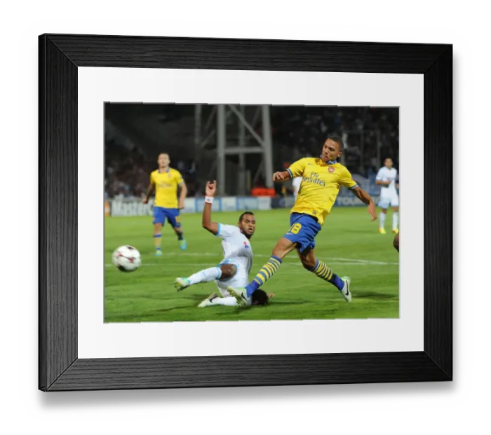 Framed Print : Clash of Champions: Kieran Gibbs vs. Giannelli Imbula - Marseille vs. Arsenal (2013-14)
