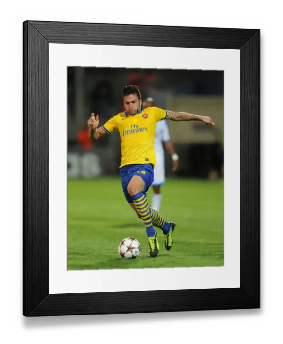Framed Print : Olivier Giroud in Action: Arsenal vs. Olympique de Marseille, UEFA Champions League 2013-14