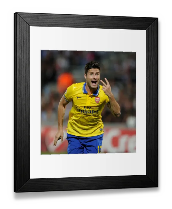 Framed Print : Olivier Giroud: Arsenal's Star Striker in Action against Olympique Marseille, UEFA Champions League 2013-14