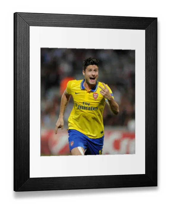 Framed Print : Olivier Giroud in Action: Arsenal vs. Olympique Marseille, UEFA Champions League 2013-14
