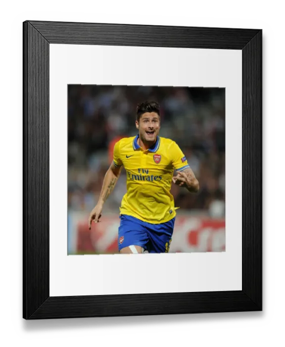 Framed Print : Olivier Giroud: In Action for Arsenal against Olympique Marseille (2013-14 Champions League) Framed Print : Olivier Giroud: In Action for Arsenal against Olympique Marseille (2013-14 Champions League)