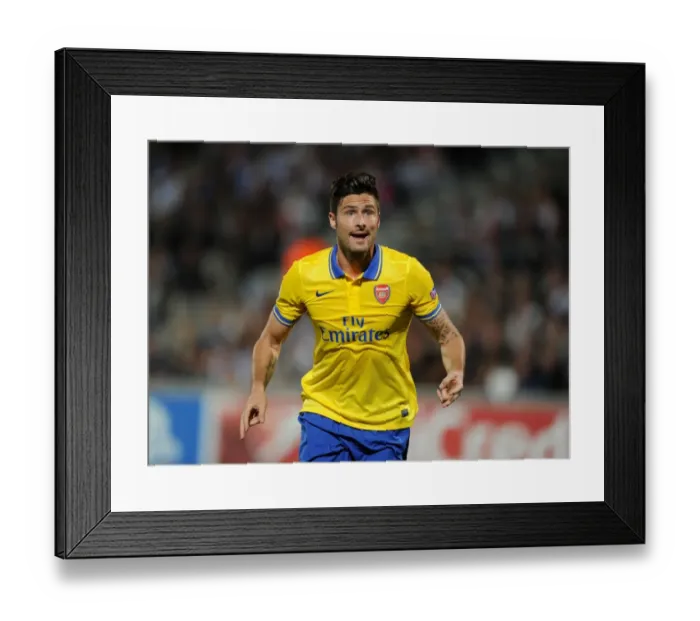 Framed Print : Olivier Giroud: Arsenal's Star Striker in Action against Olympique Marseille, UEFA Champions League 2013-14