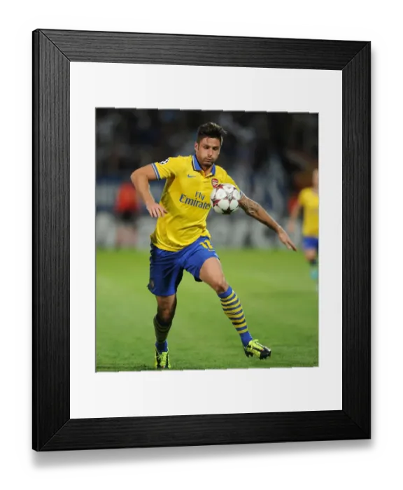 Framed Print : Olivier Giroud in Action: Arsenal vs. Marseille, UEFA Champions League (2013) Framed Print : Olivier Giroud in Action: Arsenal vs. Marseille, UEFA Champions League (2013)