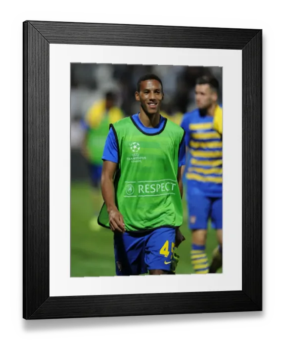 Framed Print : Isaac Hayden - Arsenal's Determination Amidst Marseille's Challenge (2013-14 Champions League)