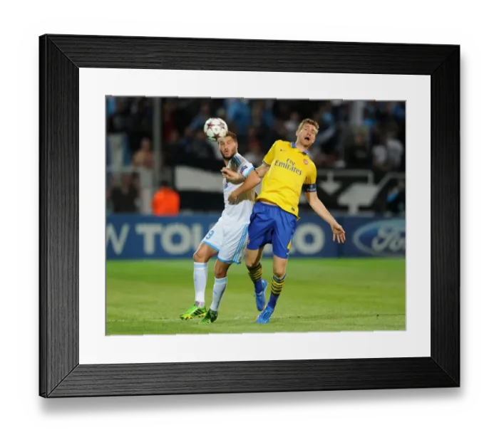 Framed Print : Per Mertesacker (Arsenal) Andre-Pierre Gignac (Marseille). Olympic Marseille 1: 2 Arsenal