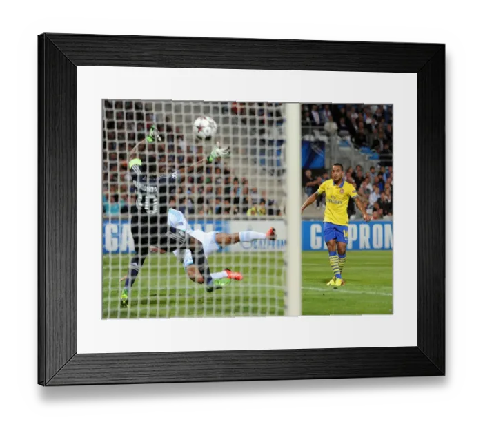 Framed Print : Theo Walcott Scores Against Mandanda: Arsenal vs. Olympique de Marseille, UEFA Champions League (2013) Framed Print : Theo Walcott Scores Against Mandanda: Arsenal vs. Olympique de Marseille, UEFA Champions League (2013)